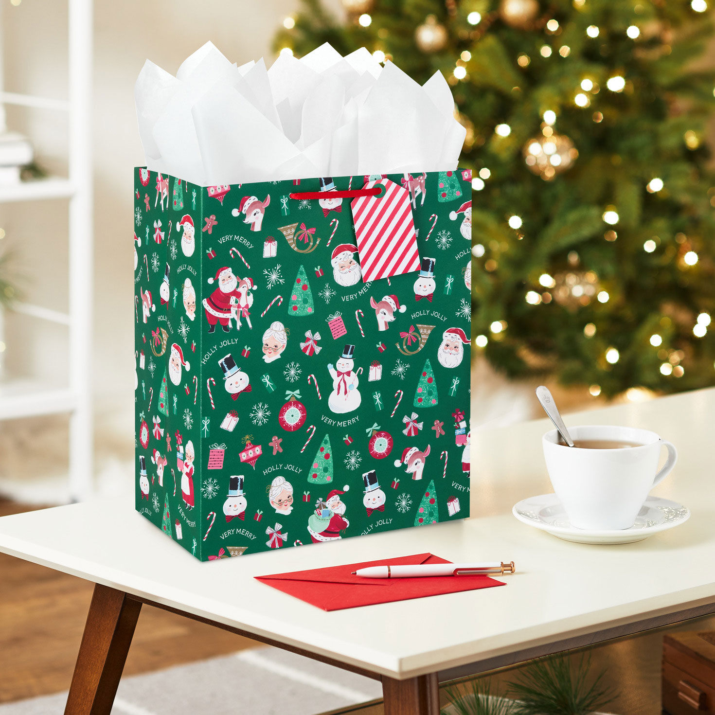 Vintage Icons on Green Large Christmas Gift Bag In Use image number 2