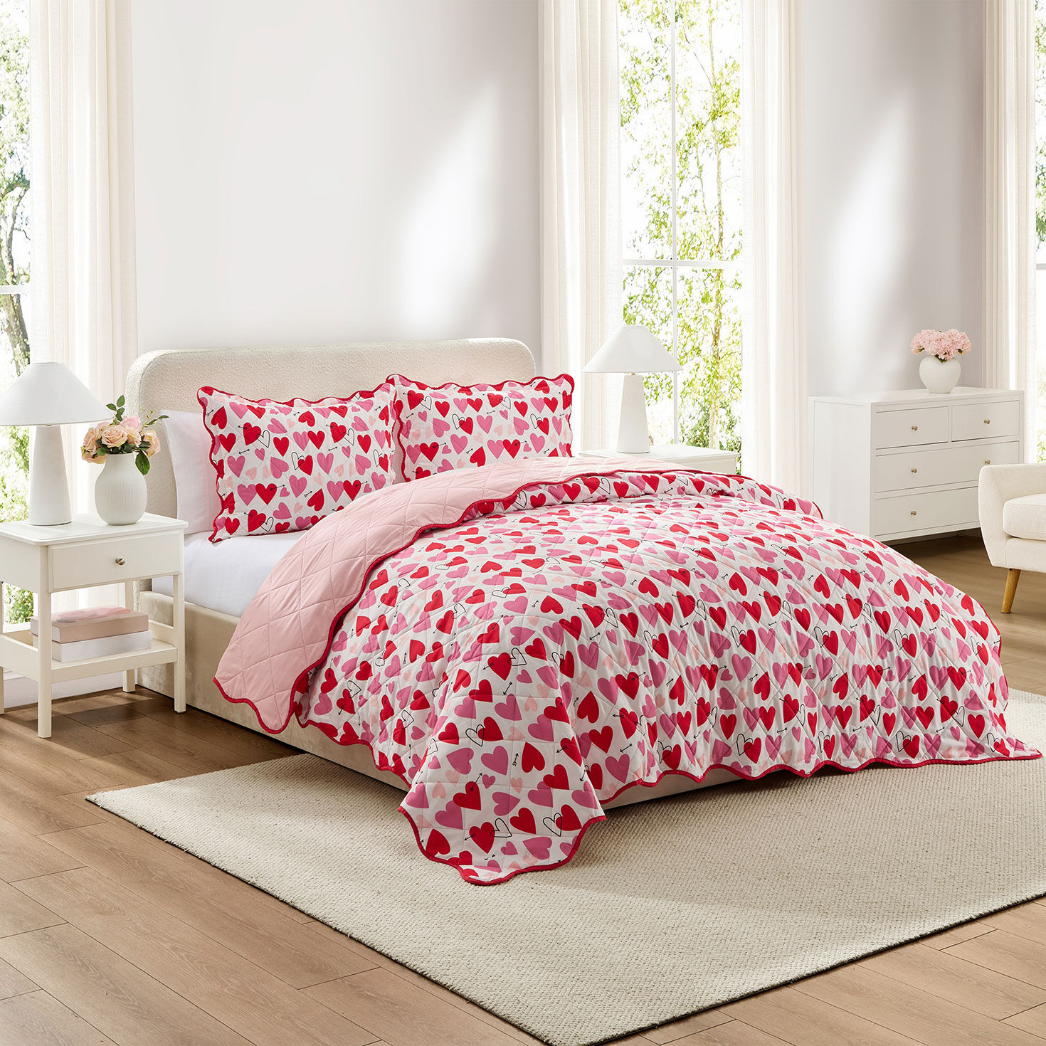 Pink and Red Hearts Reversible Quilt and Sham Set in use image number 1