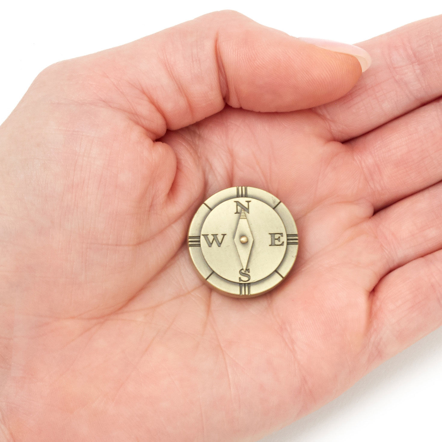 Compass Bronze Metal Worry Stone hand holding item image number 3