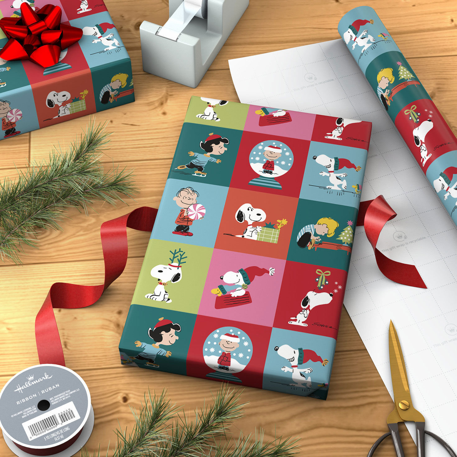 Peanuts Gang on Grid Christmas Wrapping Paper Roll in use image number 3
