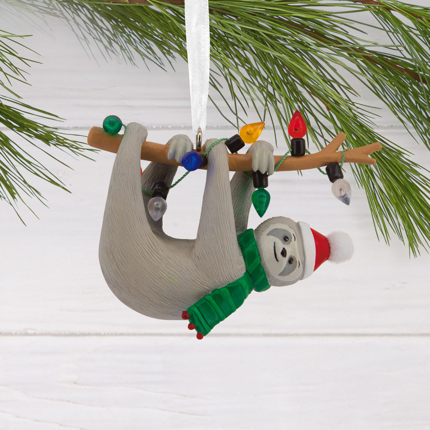Sloth on Tree Branch Christmas Ornament hanging on tree image number 2