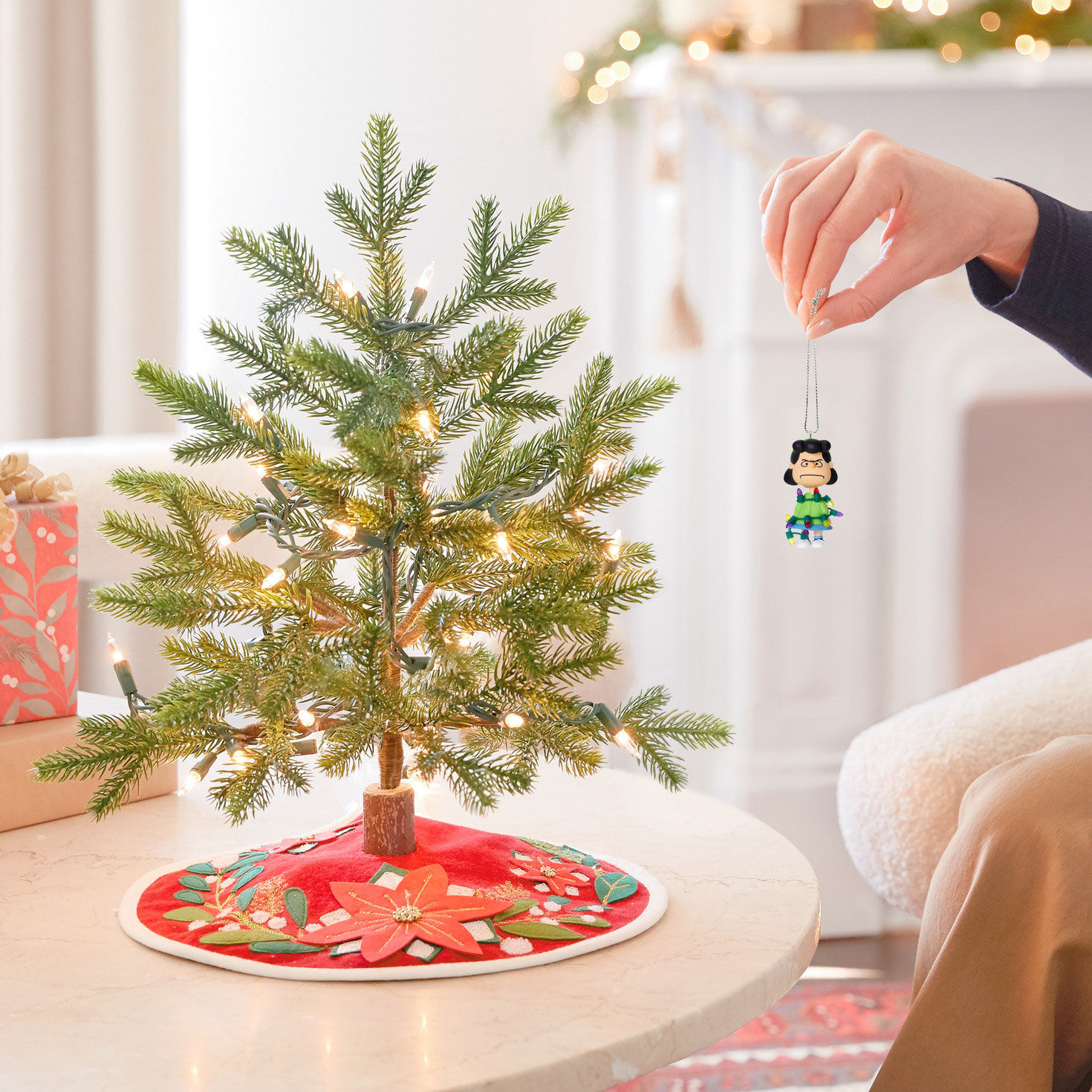 Peanuts Lucy Wrapped in Lights Keepsake Ornament hand holding item image number 4