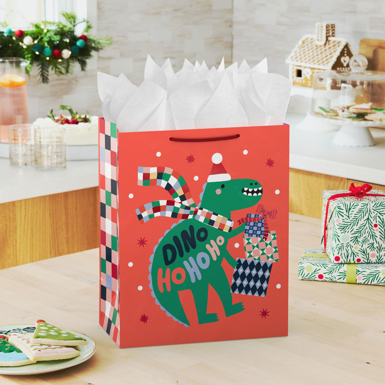 Dinosaur on Orange Large Holiday Gift Bag In use image number 2