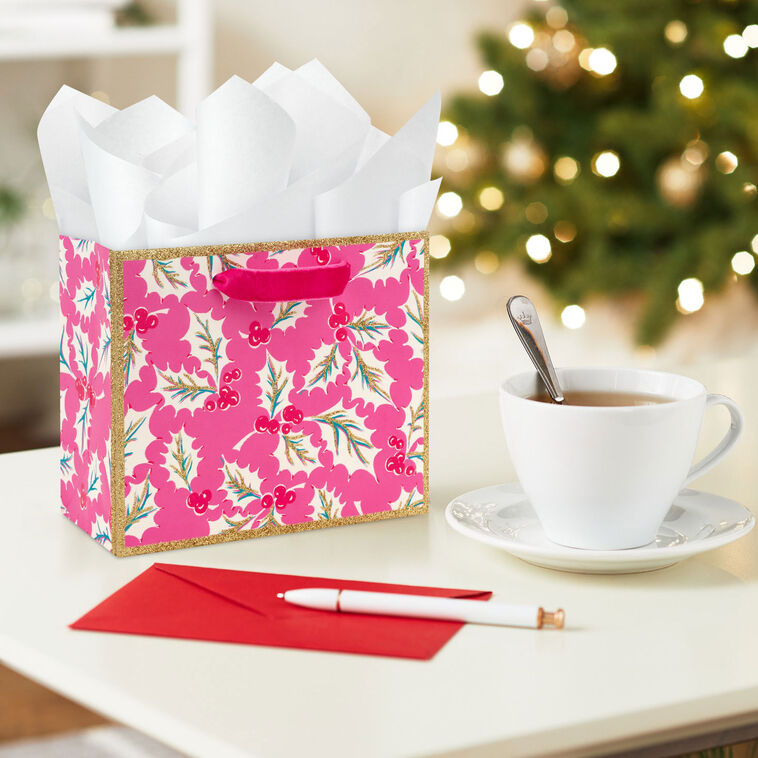 Lacey Chabert Holly Small Pink Christmas Gift Bag In use image number 2