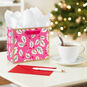 Lacey Chabert Holly Small Pink Christmas Gift Bag In use image number 2