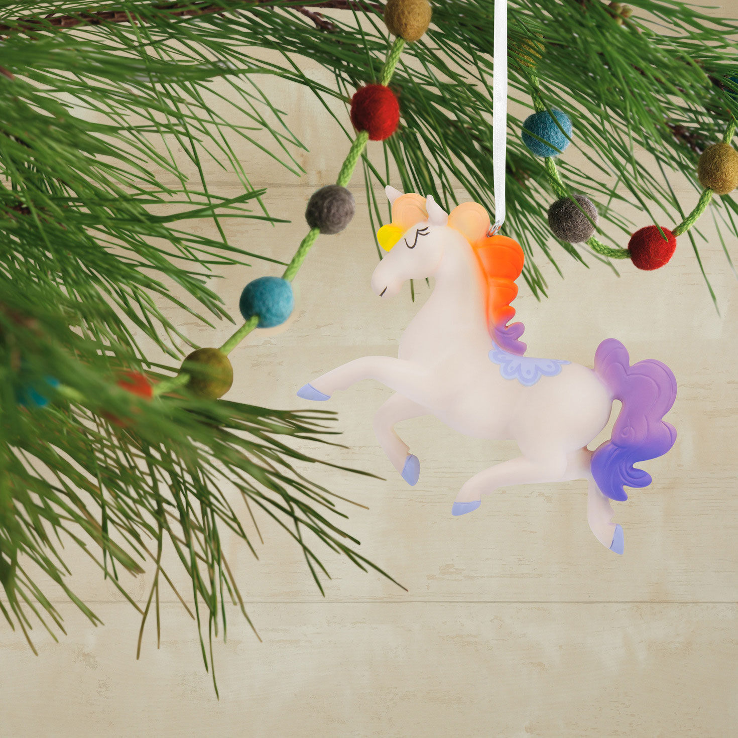 Rainbow Unicorn Christmas Ornament hanging on tree image number 2