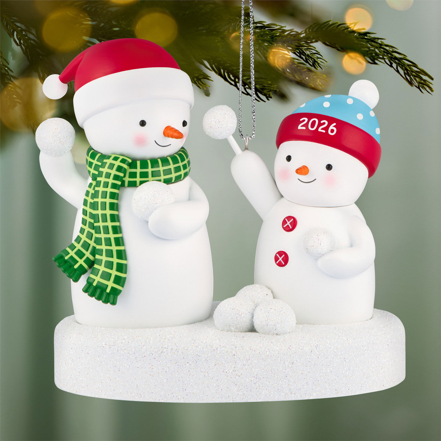 Snowmen Tossing Snowballs Keepsake Ornament hanging on tree image number 2