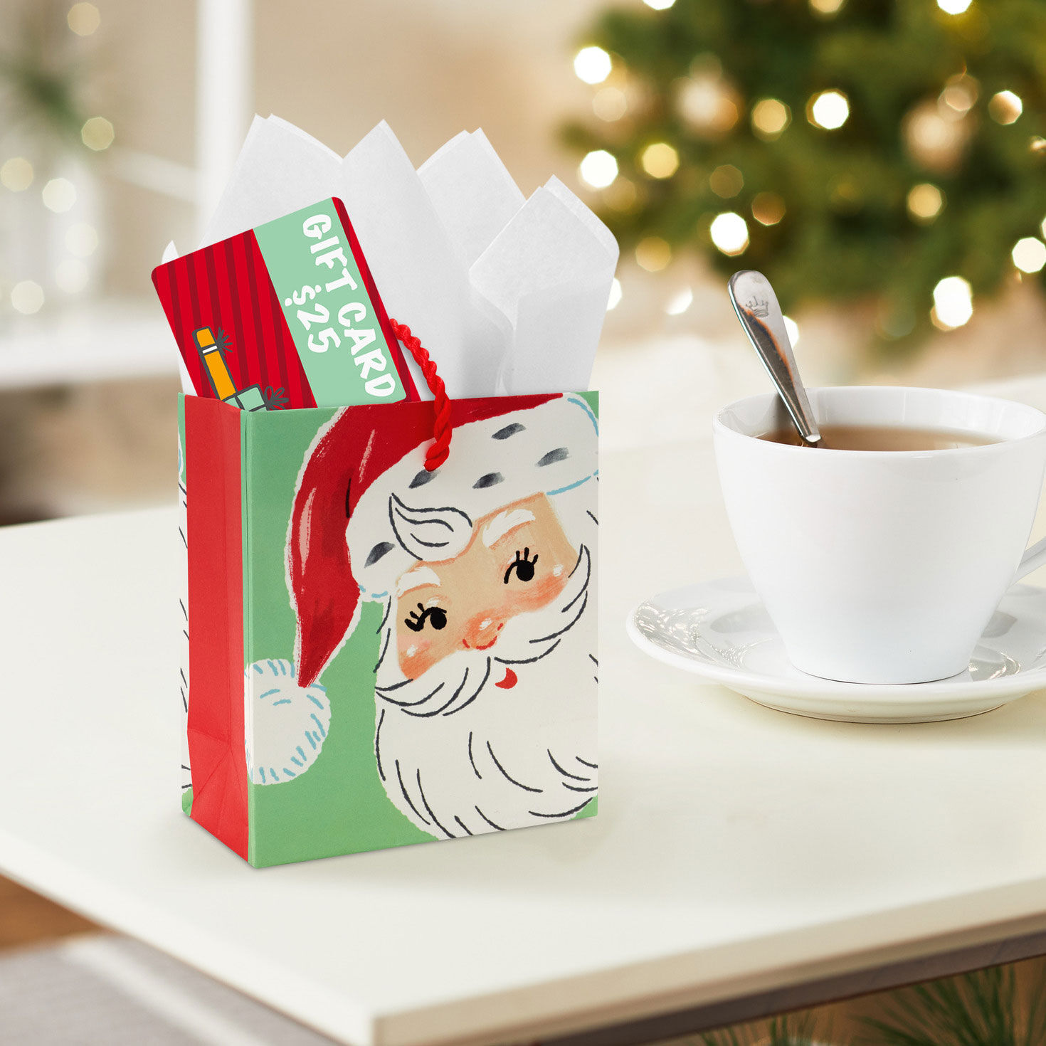 Smiling Santa on Green Christmas Gift Card Bag In use image number 2