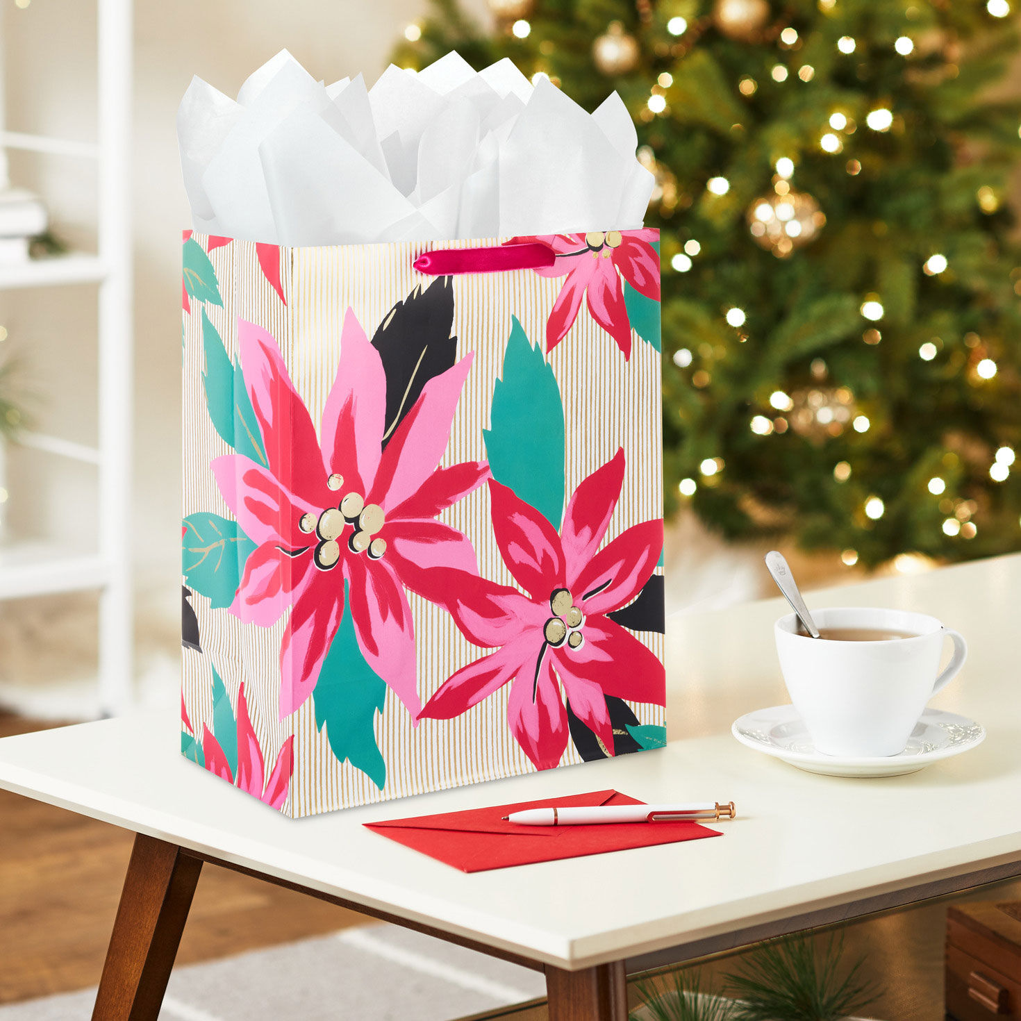Lacey Chabert Pink Poinsettias Christmas Gift Bag In Use image number 2