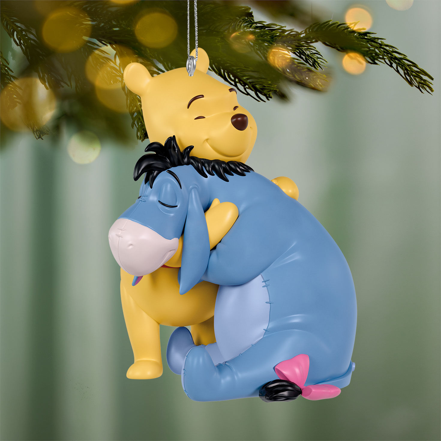 Winnie the Pooh Hugging Eeyore Keepsake Ornament hanging on tree image number 2