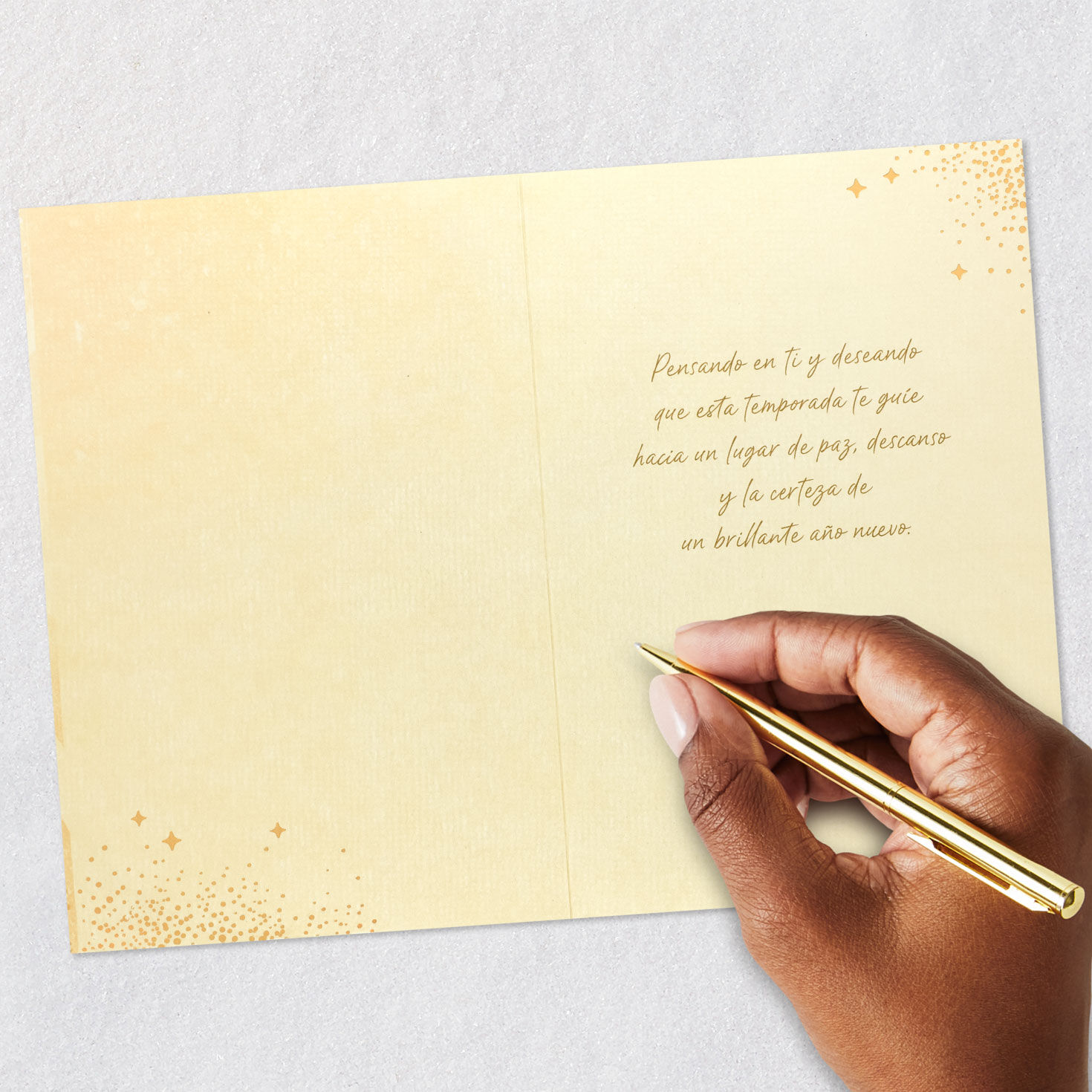 Elegant Gold Starburst Christmas Card in Spanish Signing card image number 6