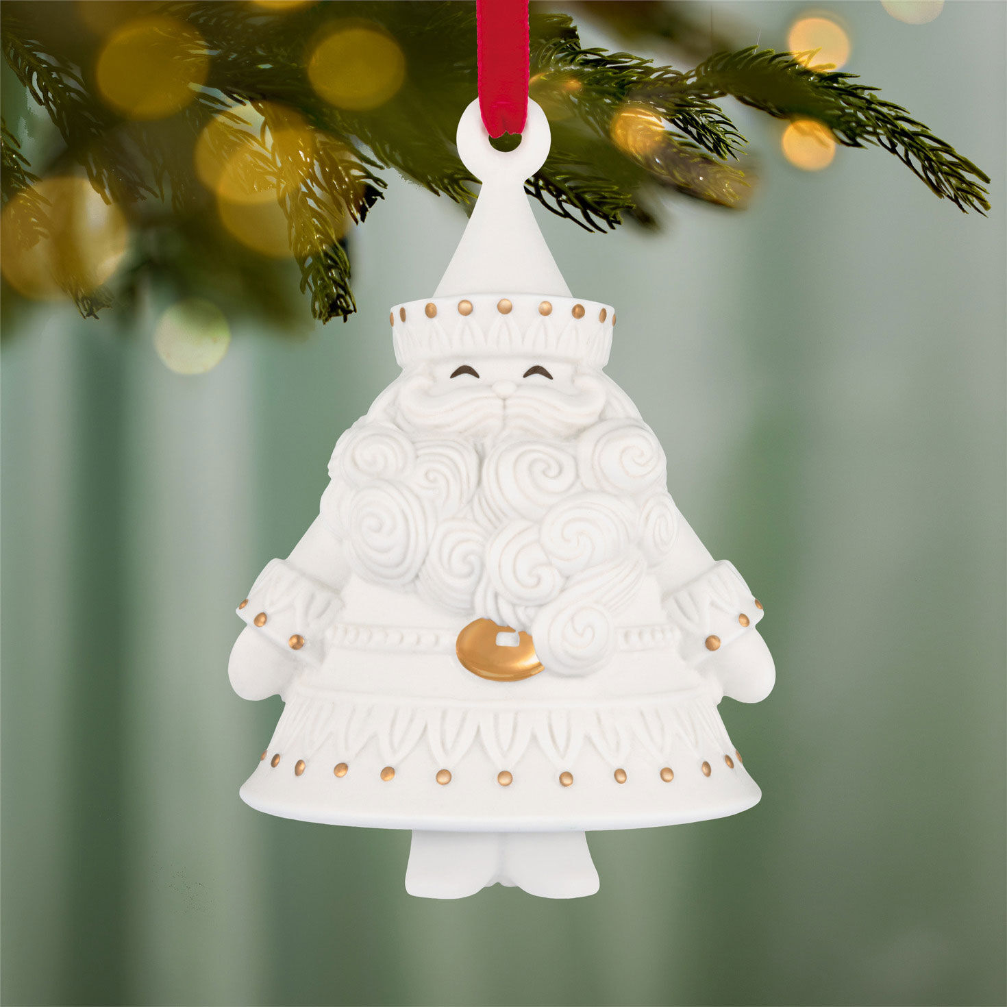 White Porcelain Santa With Gold Keepsake Ornament hanging on tree image number 2