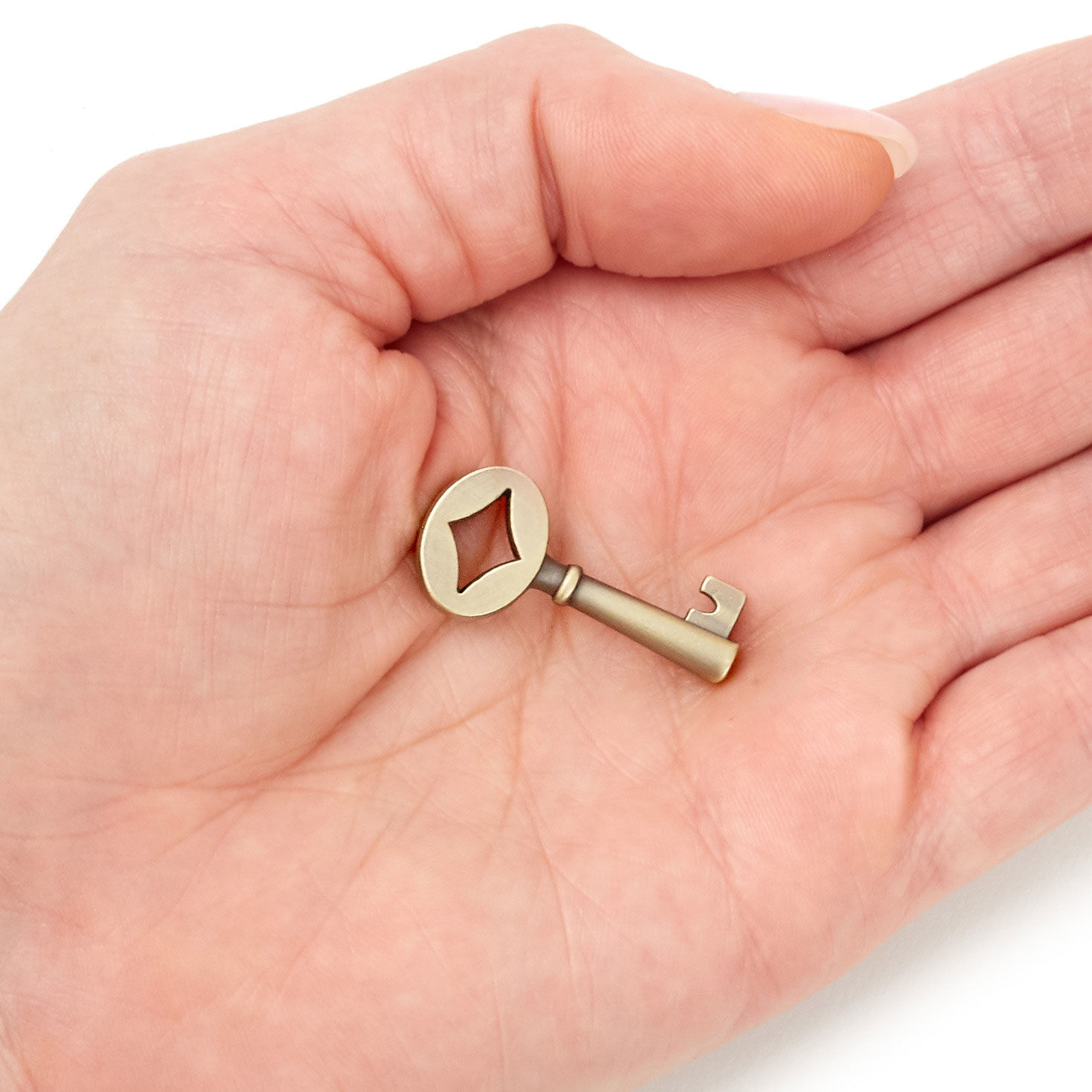 Key-Shaped Inspirational Metal Pocket Token item on hand image number 3