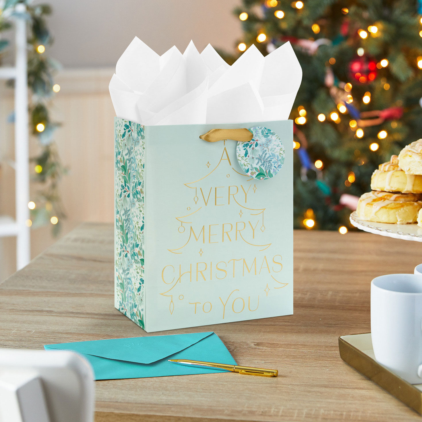 A Very Merry Christmas Mint Green Medium Gift Bag in use image number 2