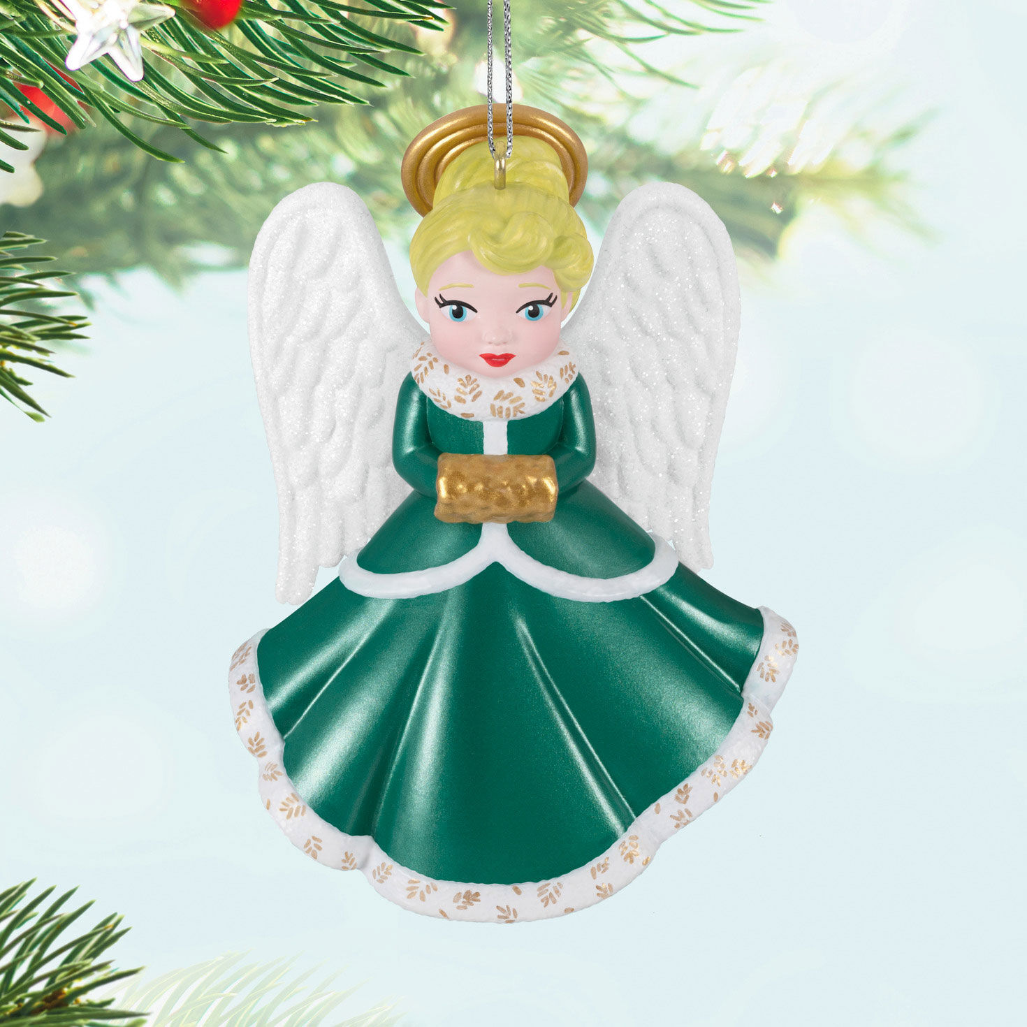 Angel in Green Dress With Muff Keepsake Ornament Hanging on tree image number 2
