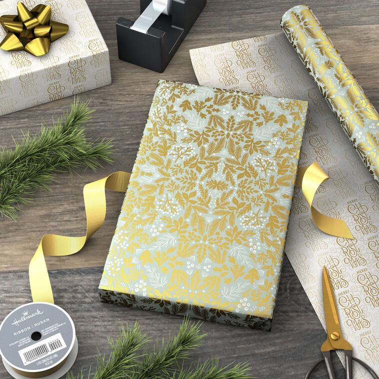 Floral on Blue/Merry Christmas Reversible Gift Wrap in use image number 3