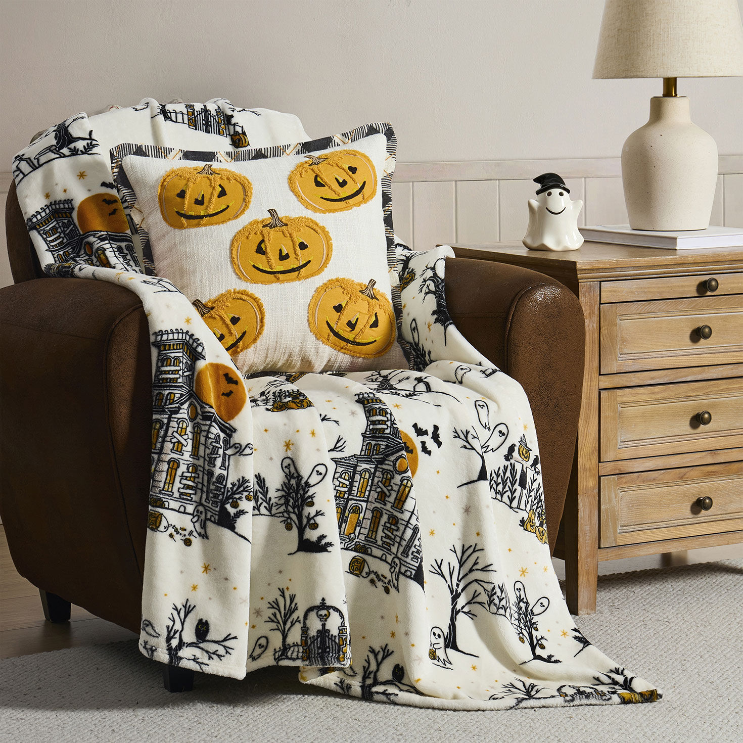 Hallmark Multicolor 50" x 70" Plush Halloween Throw Blanket in use image number 4