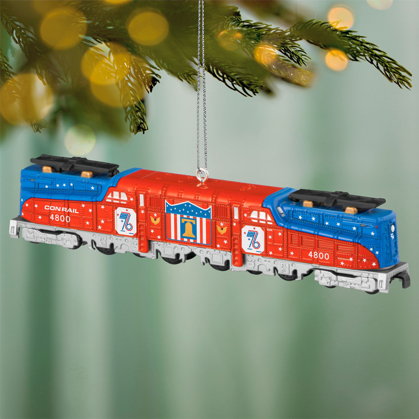 Lionel Red and Blue Train Engine Ornament hanging on tree image number 2