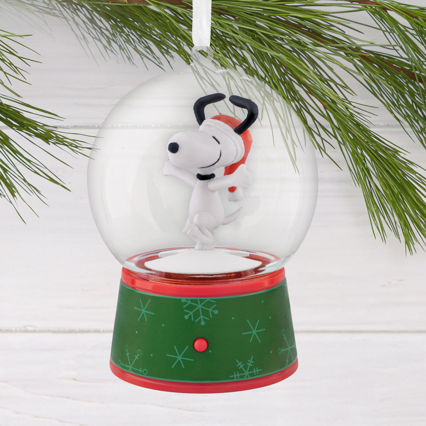 Snoopy Snow Globe Christmas Ornament hanging on tree image number 2