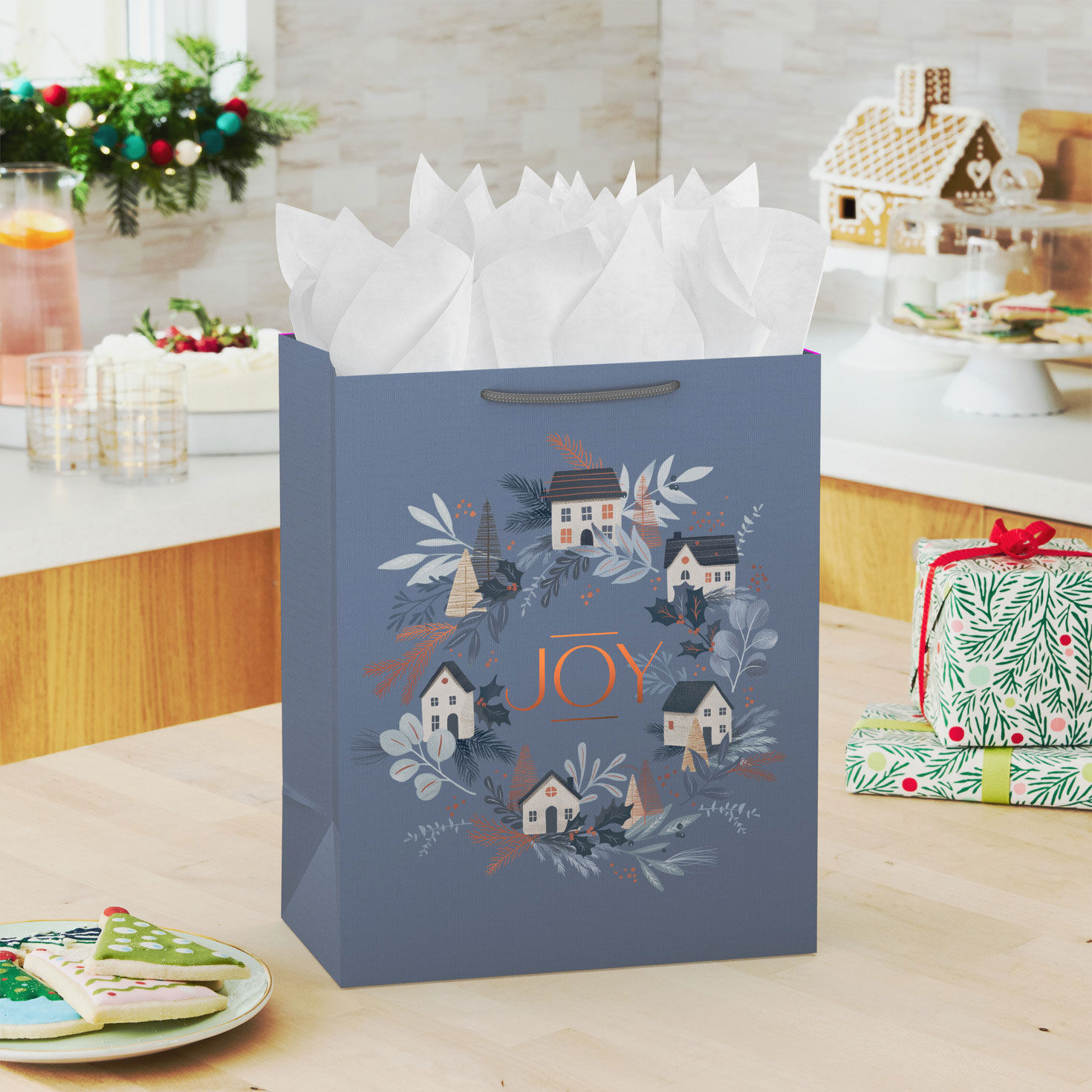Cottages on Icy Blue Large Holiday Gift Bag In use image number 2