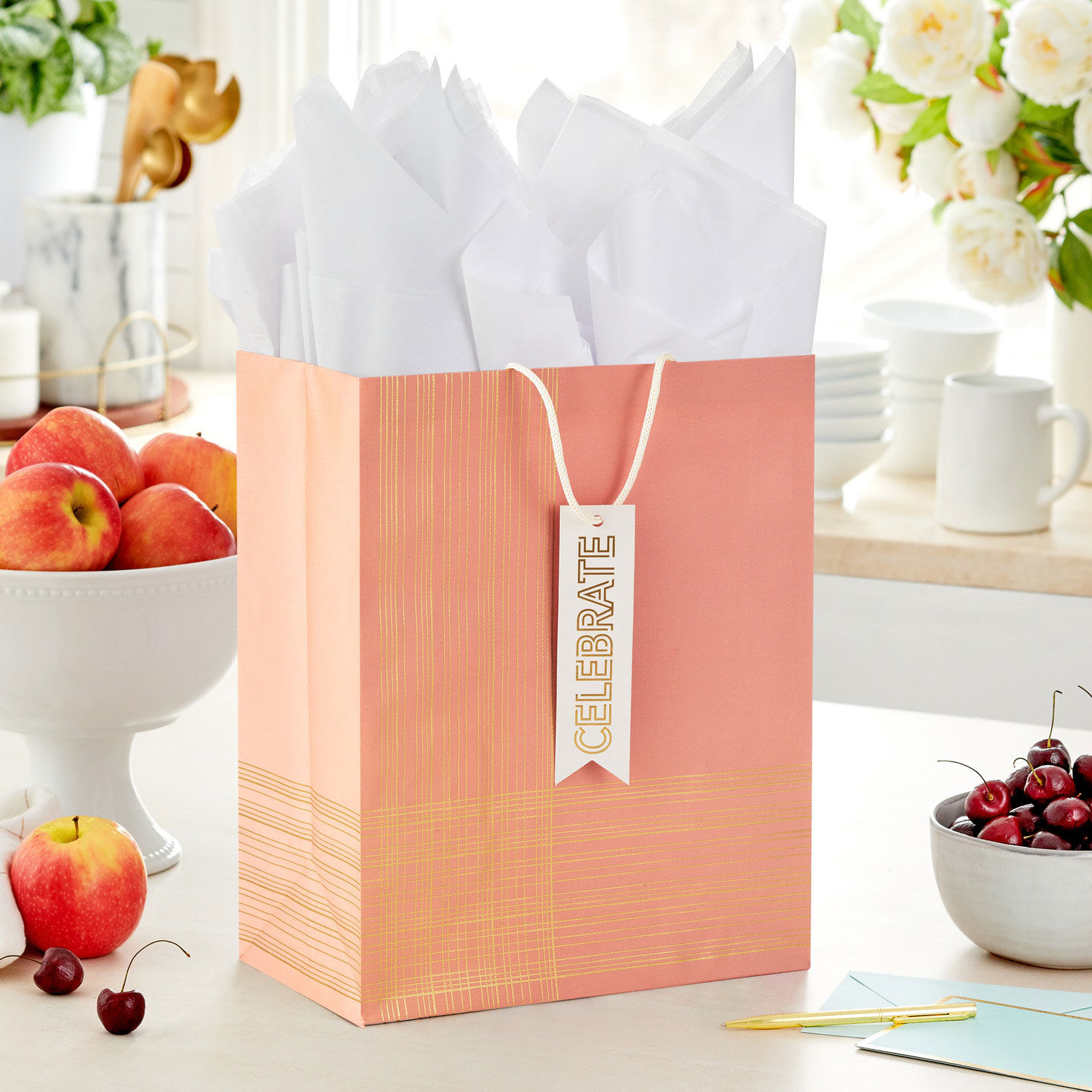 Gold Lines on Coral Large Gift Bag In use image number 2