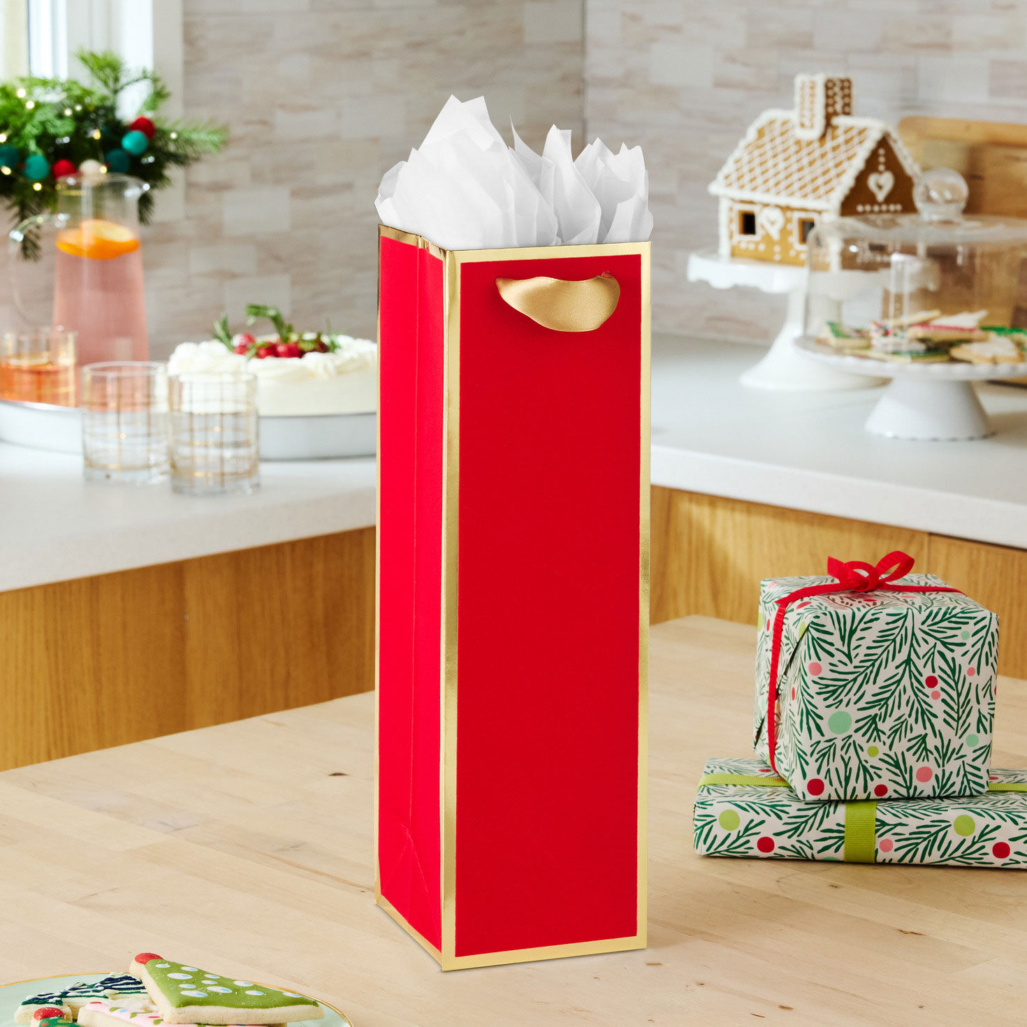 Red and Gold Holiday Bottle Gift Bag in use image number 2