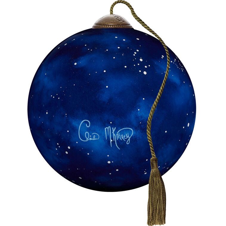 Santa and Mrs. Claus Kissing Blown Glass Ornament back image number 2
