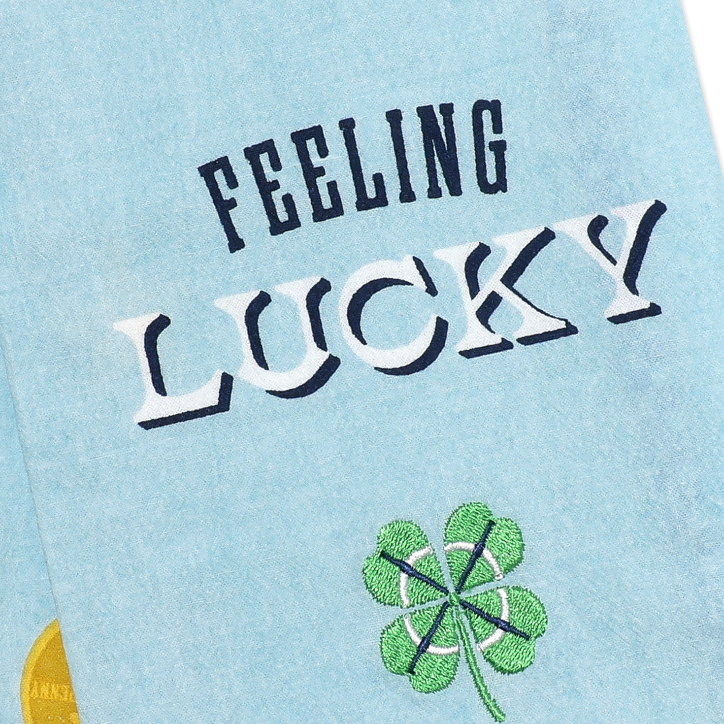 Blue Tea Towel With Embroidered Lucky Icons upclose detail image number 3