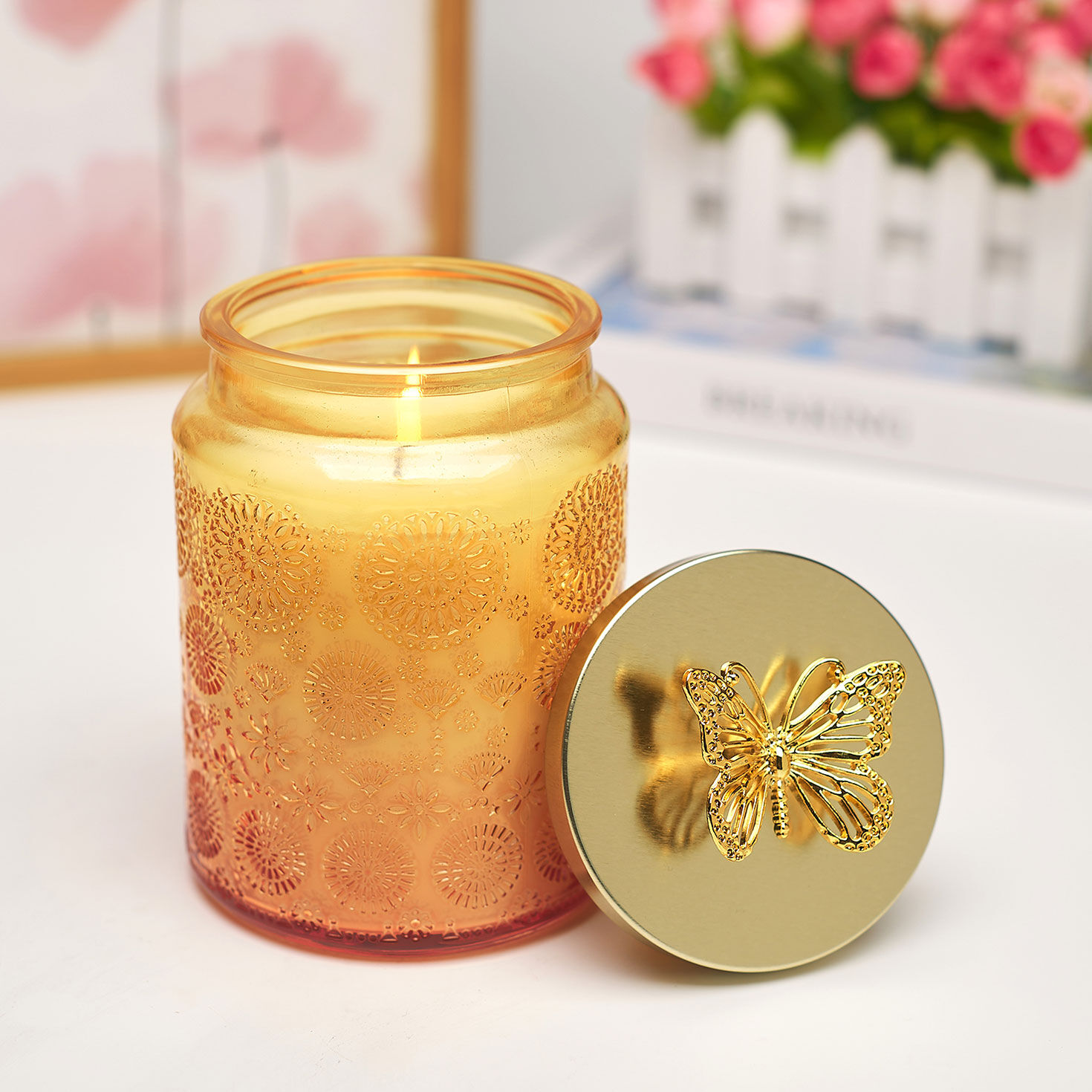 Lemon Scented Candle in Orange Glass Jar in use image number 6