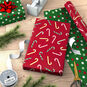 Candy Canes/Dots Christmas Reversible Gift Wrap in use image number 3