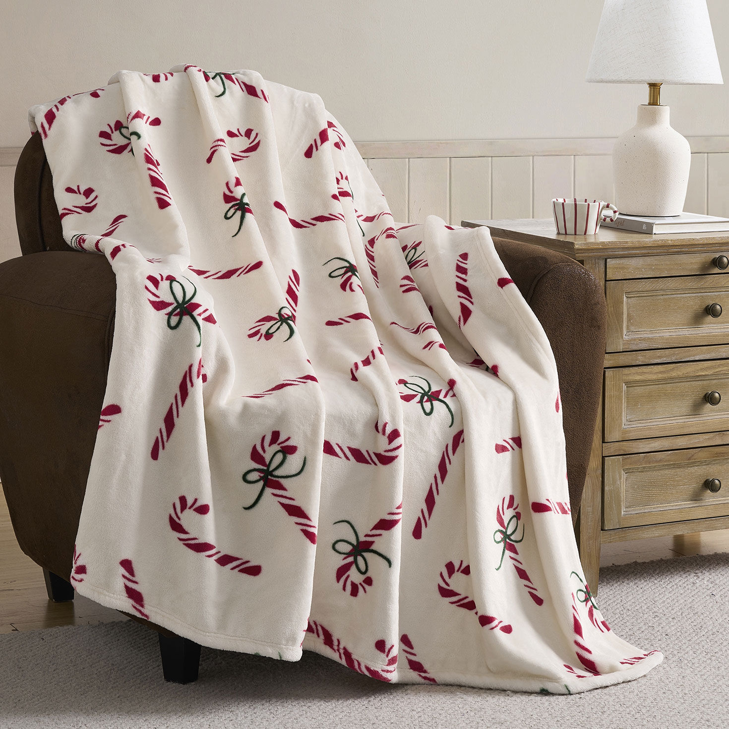 Hallmark Candycanes Plush Throw - 50x70 in use image number 4