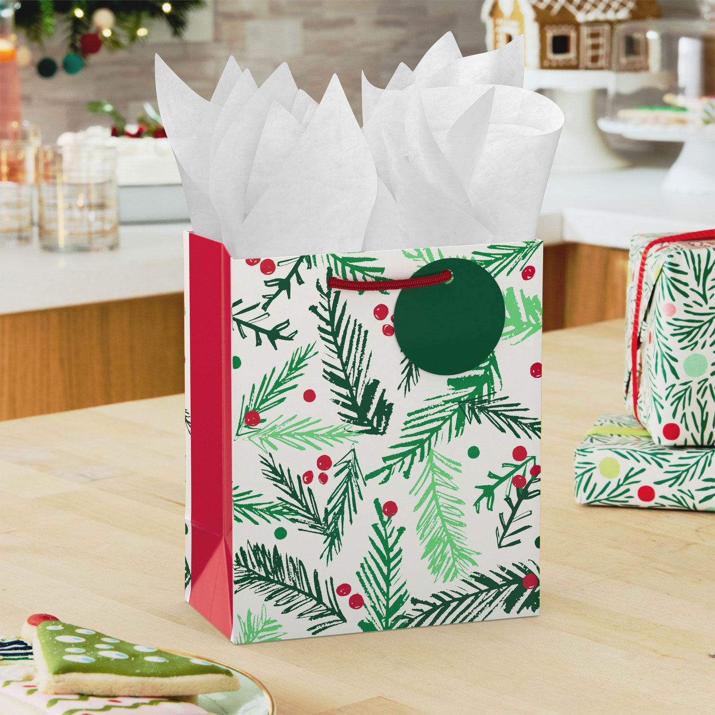 Evergreen Small Holiday Gift Bag with Tissue in use image number 2