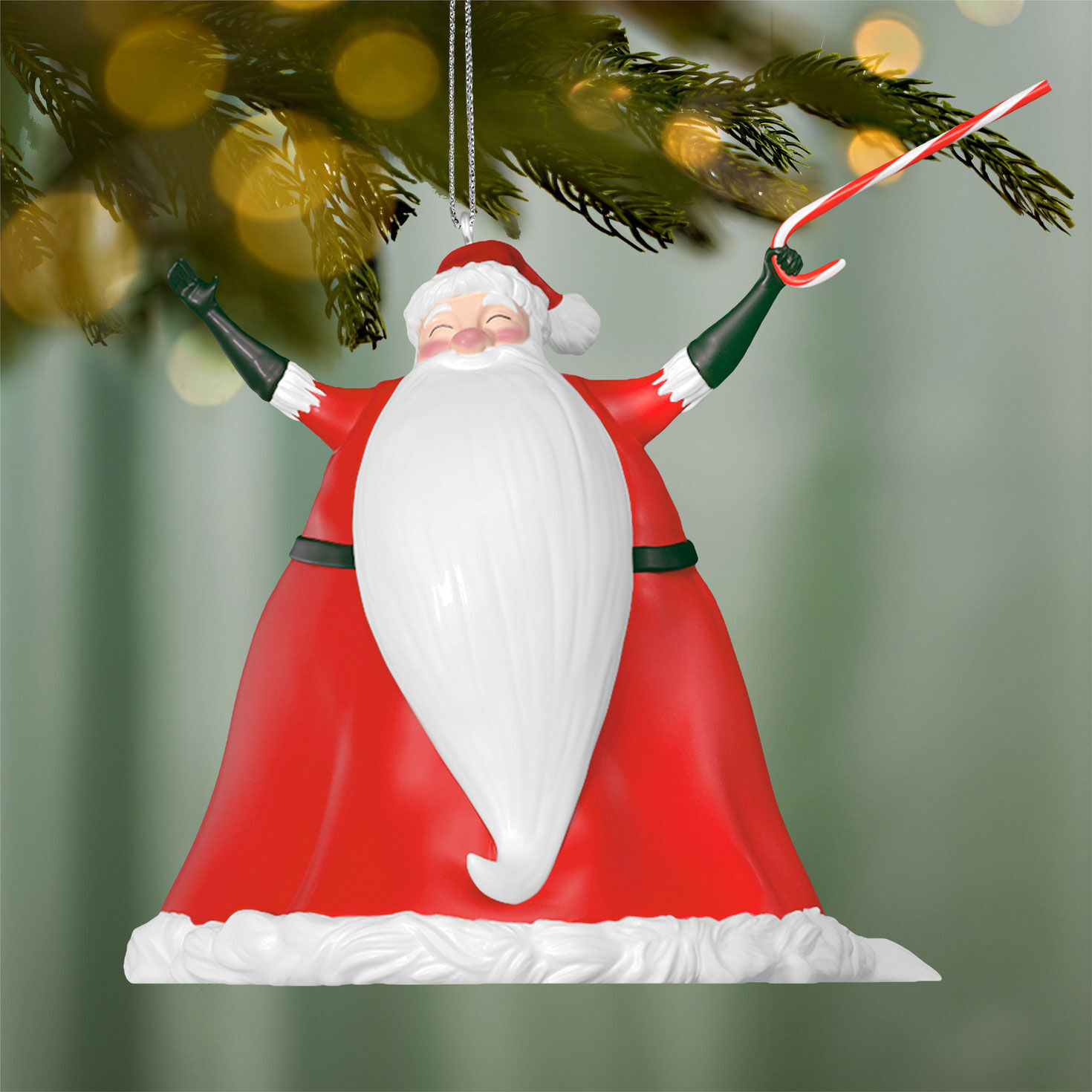 Santa Claus With Candy Cane Keepsake Ornament hanging on tree image number 2
