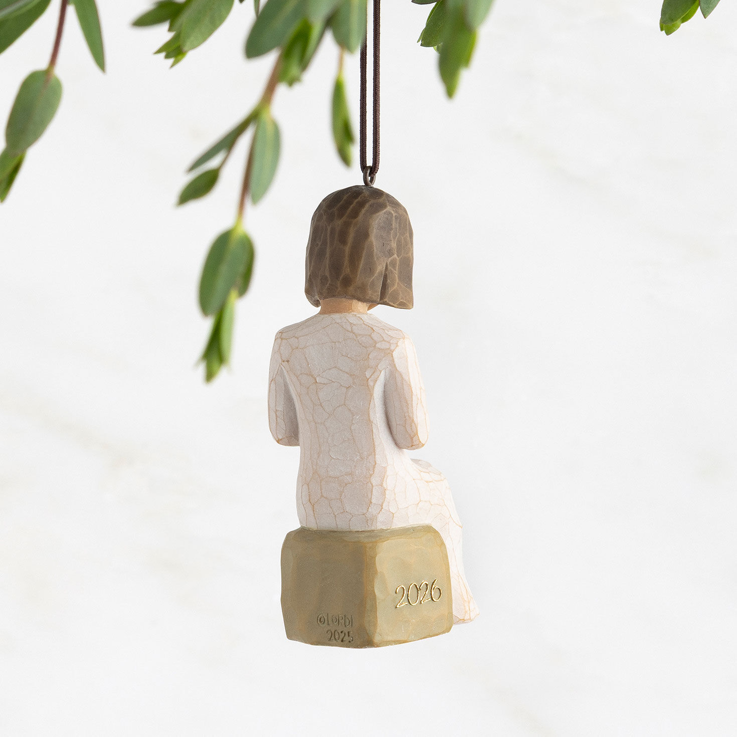 Seated Figure 2026 Year-Dated Ornament Back image number 2