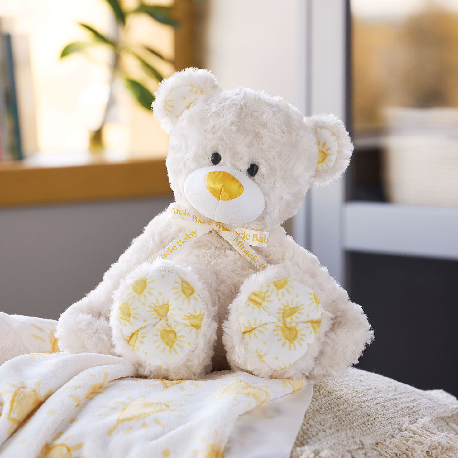 Cream Bear Stuffed Animal With Yellow Heart Accents in use image number 5