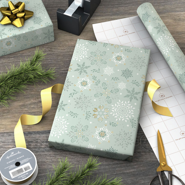 Snowflakes on Sage Wrapping Paper Roll in use image number 3