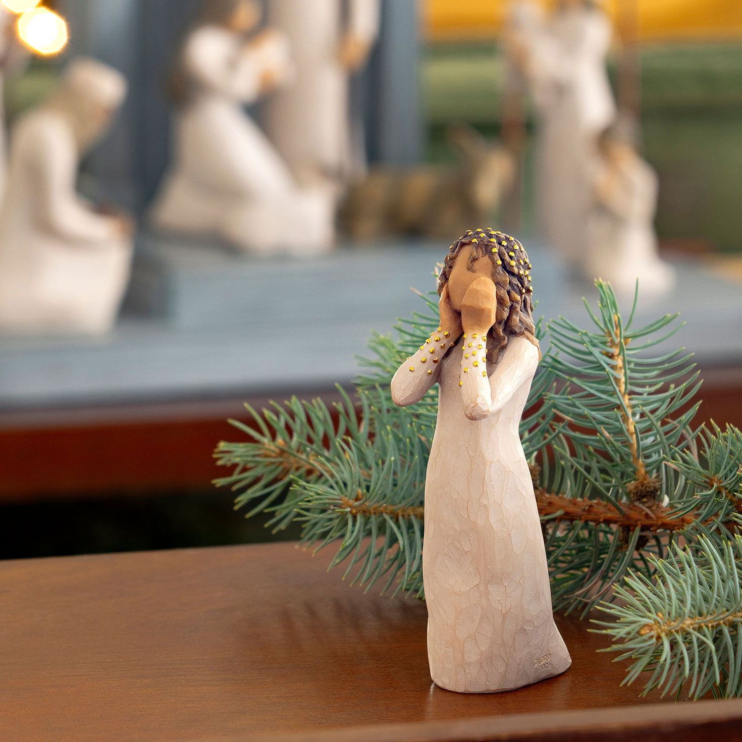 Girl With Hands on Face and Gold Accents Figurine  image number 7