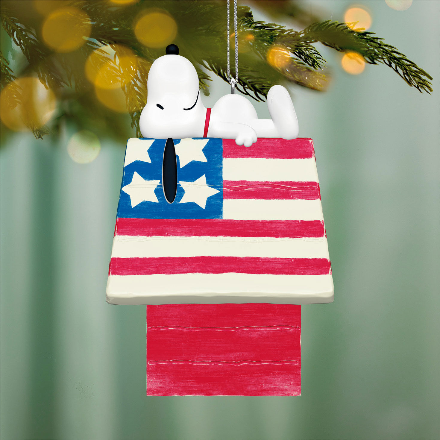 Snoopy on Patriotic Doghouse Keepsake Ornament hanging on tree image number 2