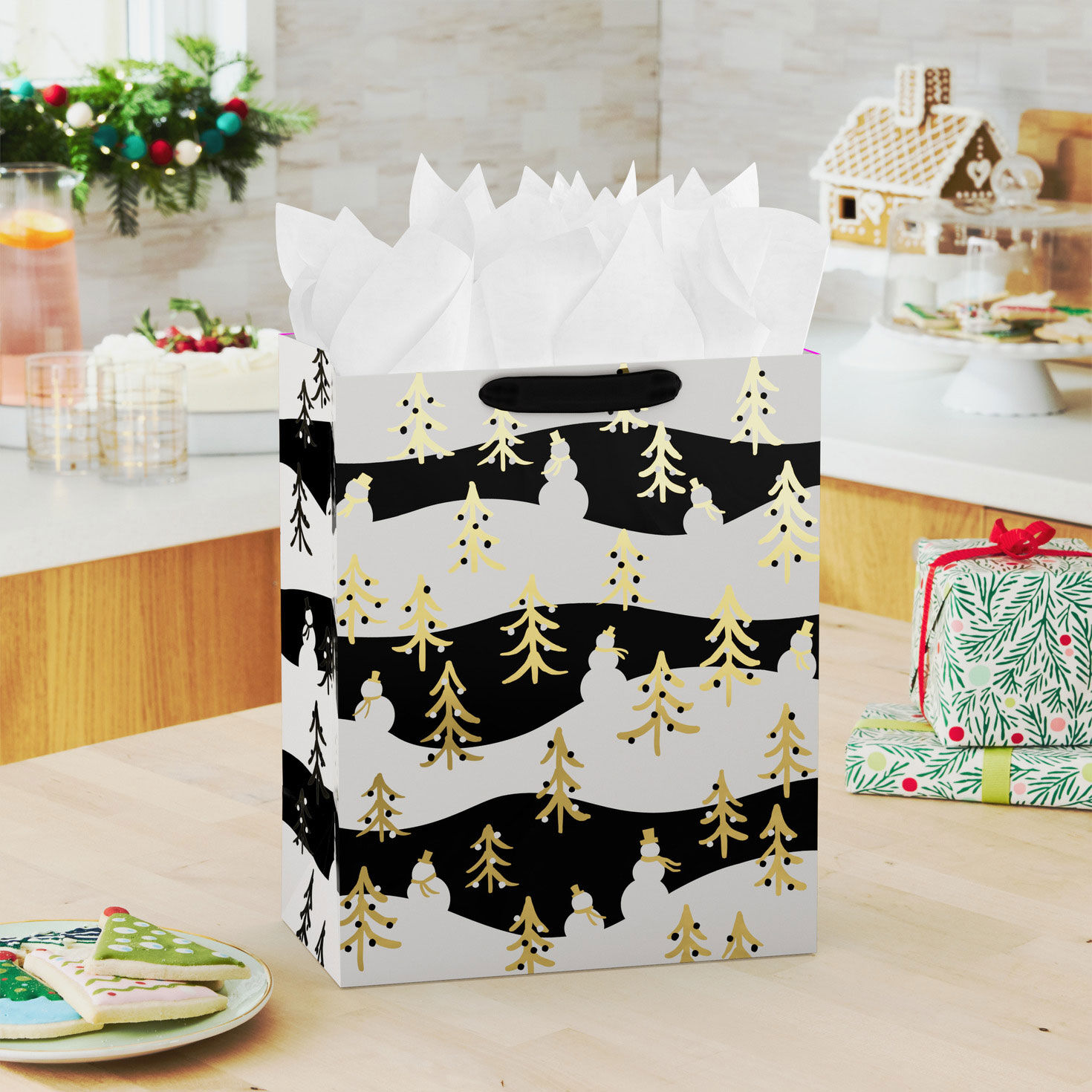 Gold Trees on Black and White Large Holiday Gift Bag In use image number 2