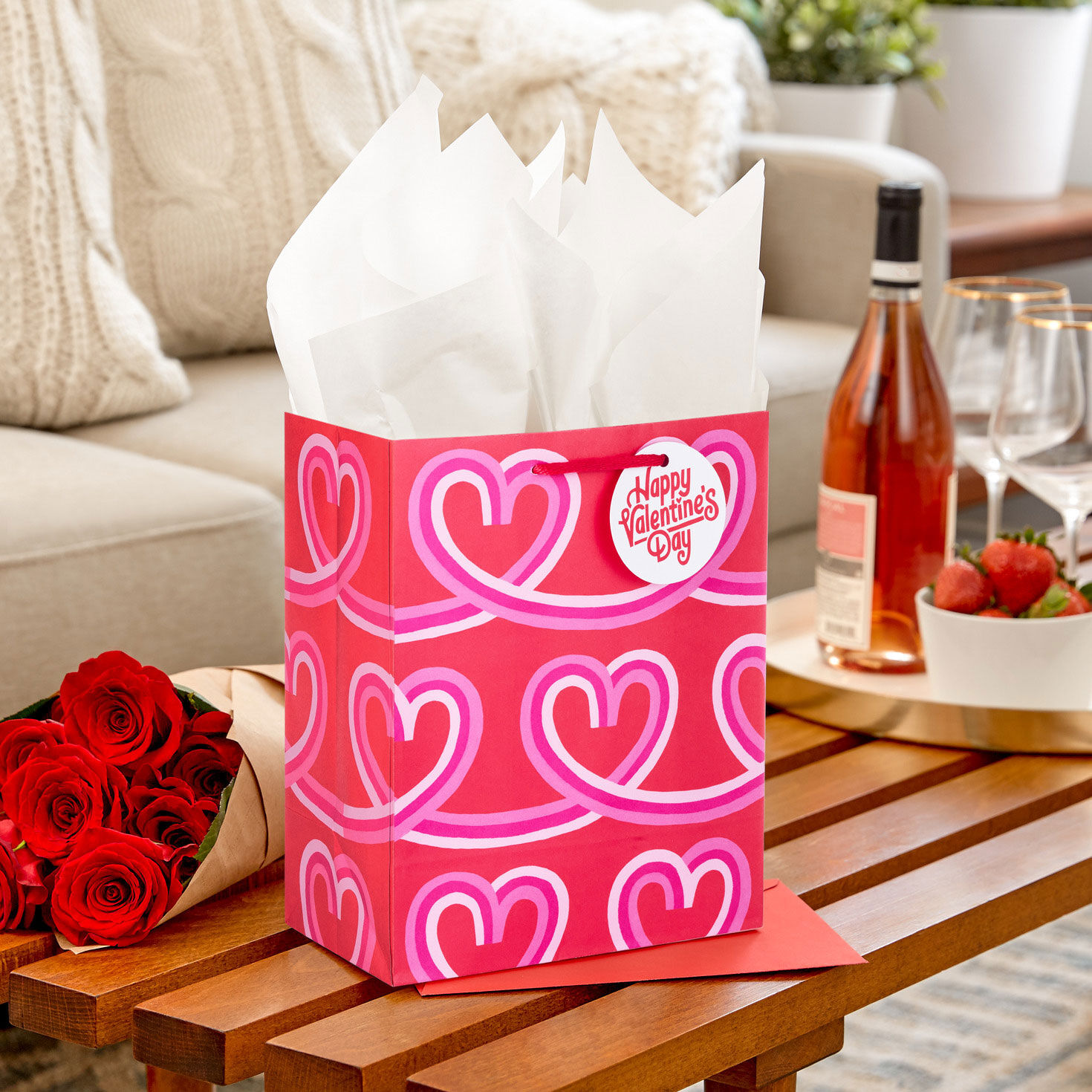 Looped Hearts Valentine's Day Gift Bag With Tissue in use image number 2