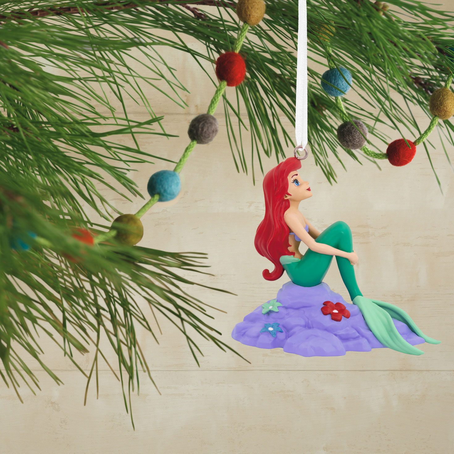 Little Mermaid Ariel on Rock Christmas Ornament hanging on tree image number 2
