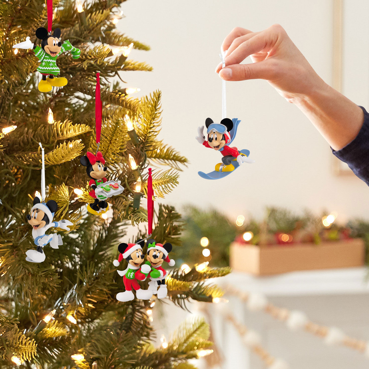 Set of 5 Mickey and Minnie Christmas Ornaments hand holding item image number 4