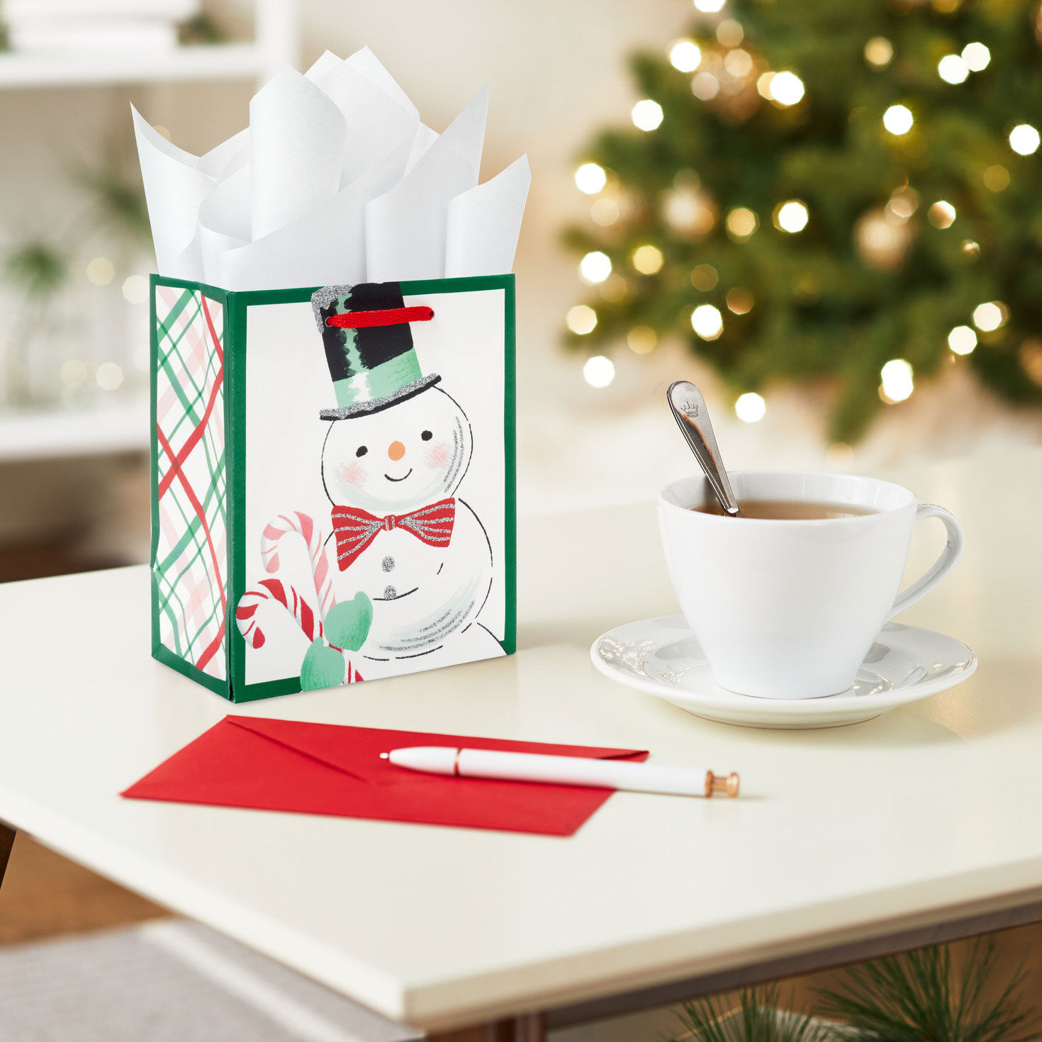 Smiling Snowman on White Small Holiday Gift Bag In use image number 2