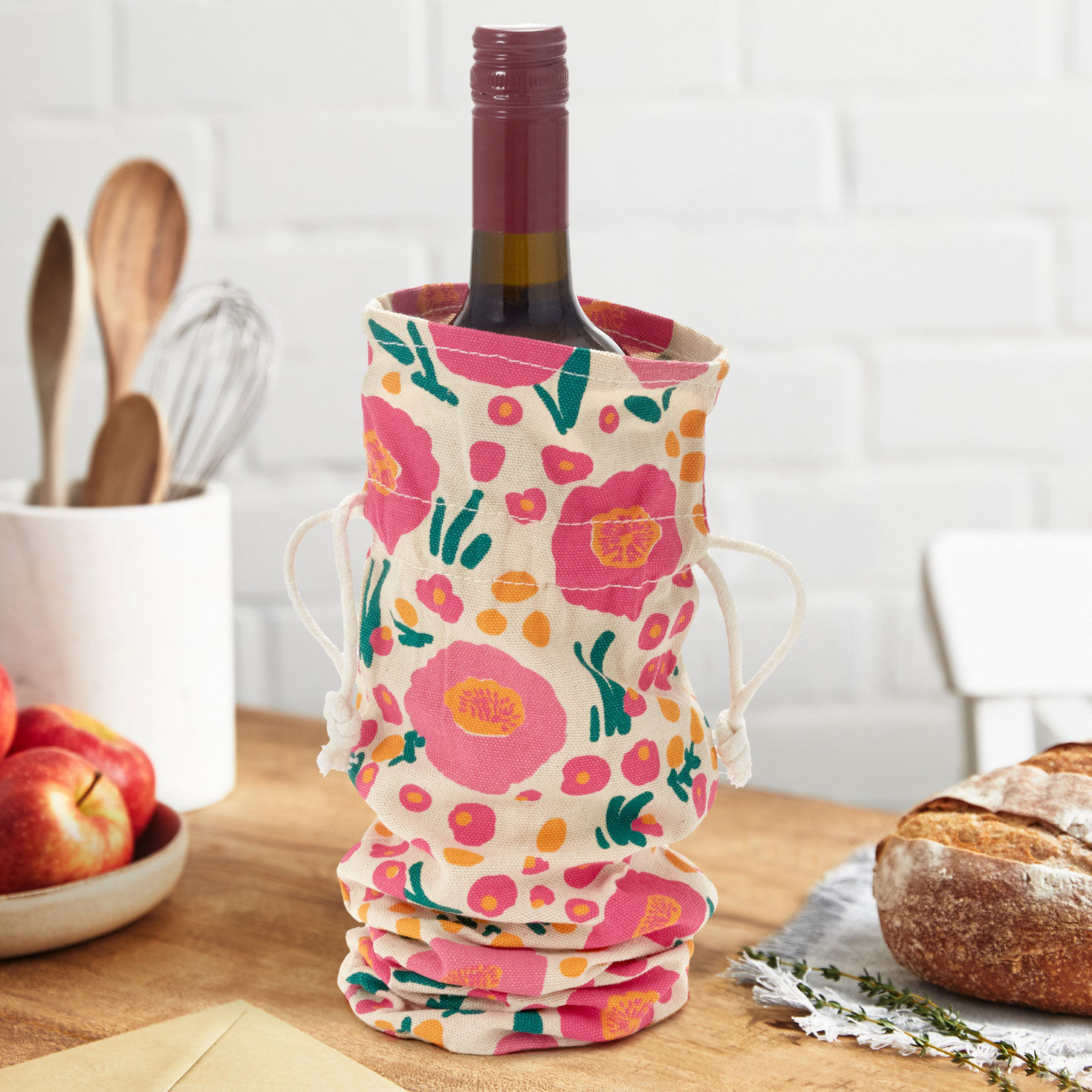 Pink Floral Fabric Wine Gift Bag In use image number 2