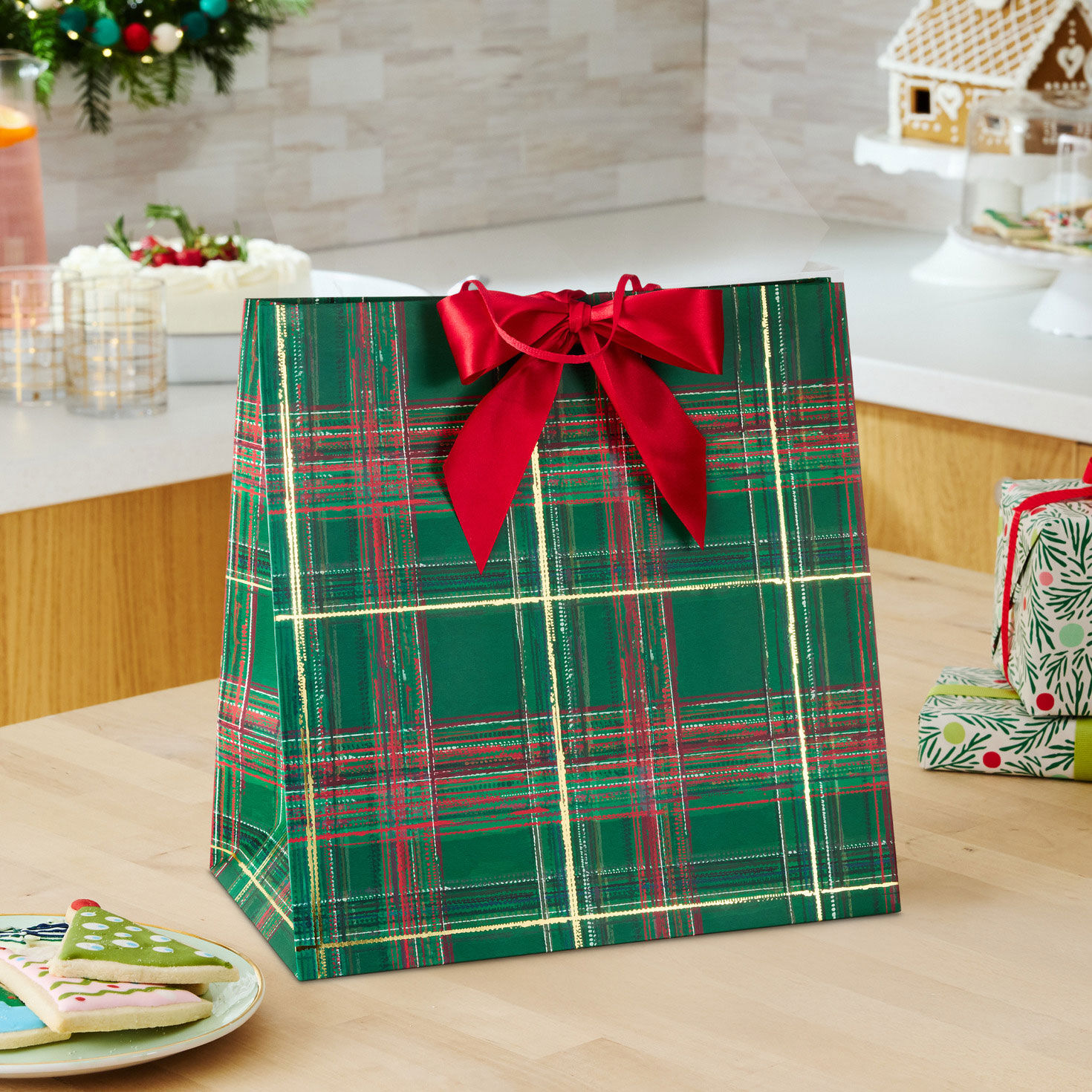 Green Plaid with Red Bow Christmas Gift Bag in use image number 2
