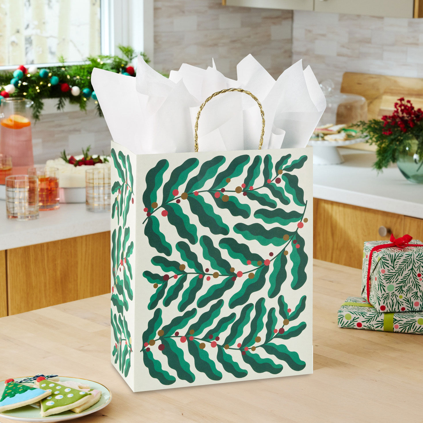 Modern Green Holly Leaves Large Holiday Gift Bag in use image number 2