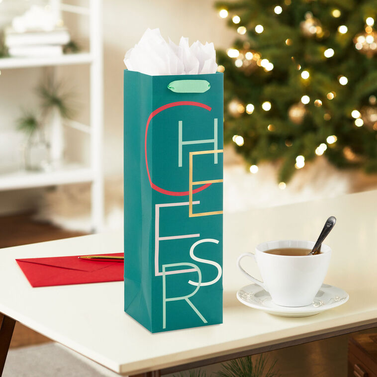 Cheers on Green Wine Gift Bag In Use image number 2