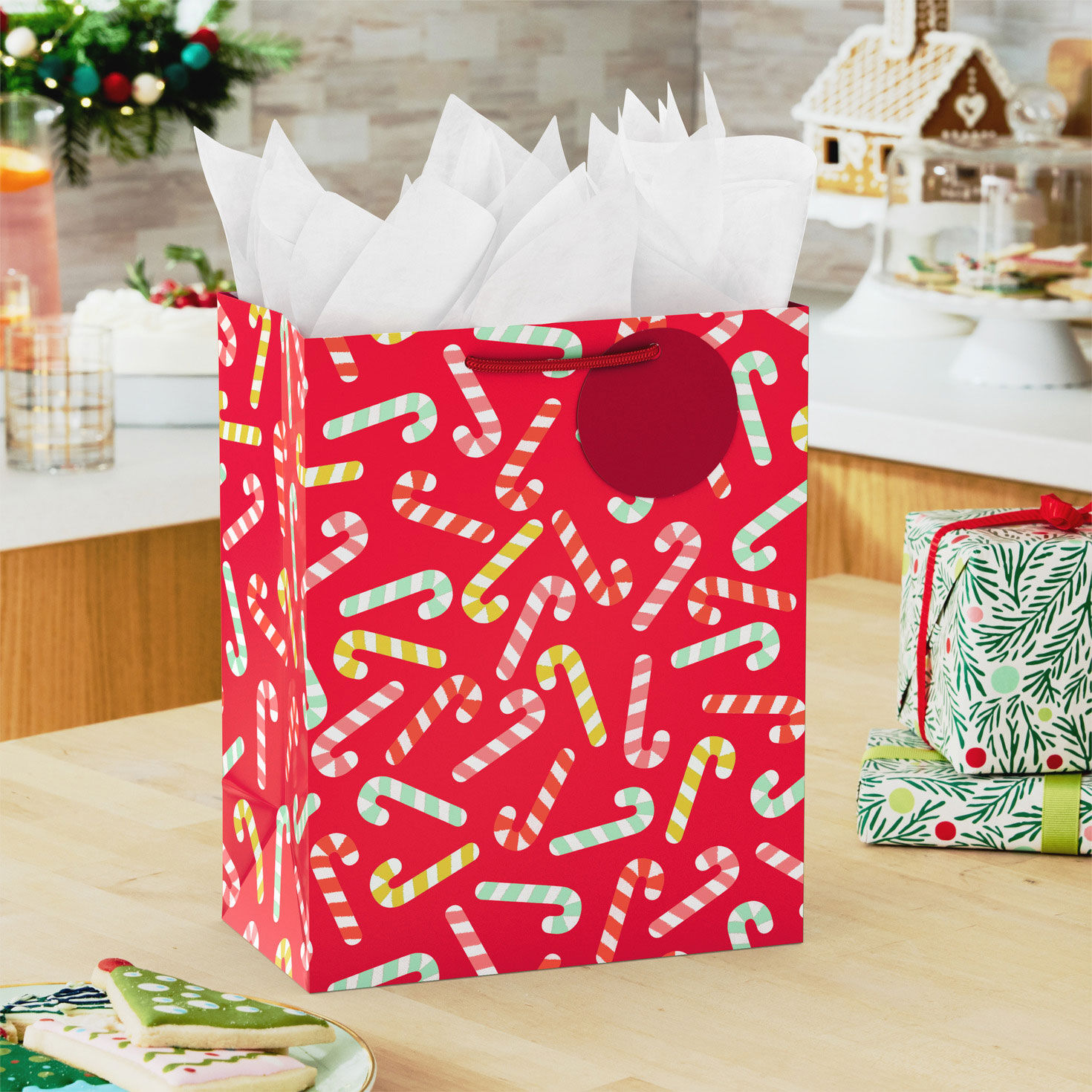 Candy Canes on Red Holiday Gift Bag with Tissue in use image number 2