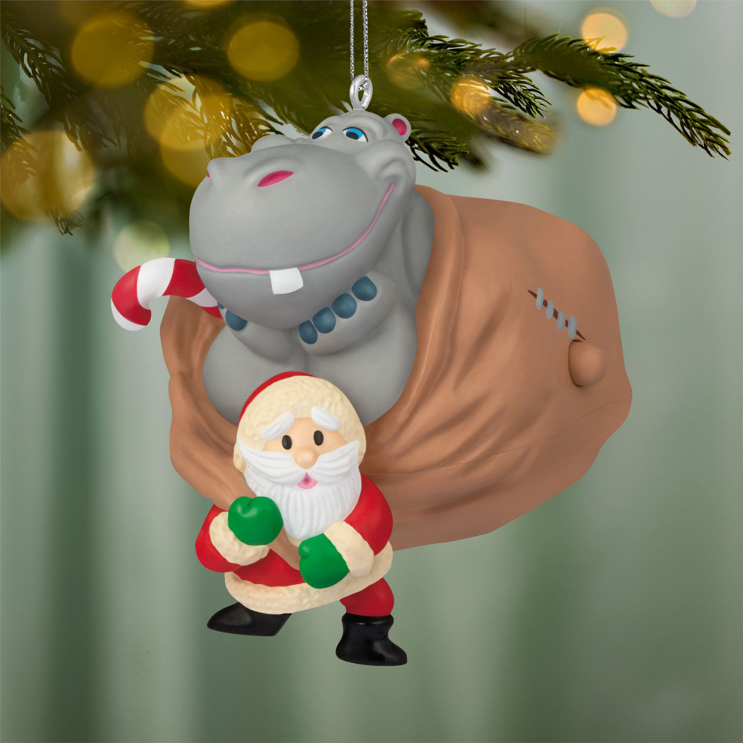 Hippo in Santa's Sack Keepsake Ornament hanging on tree image number 2