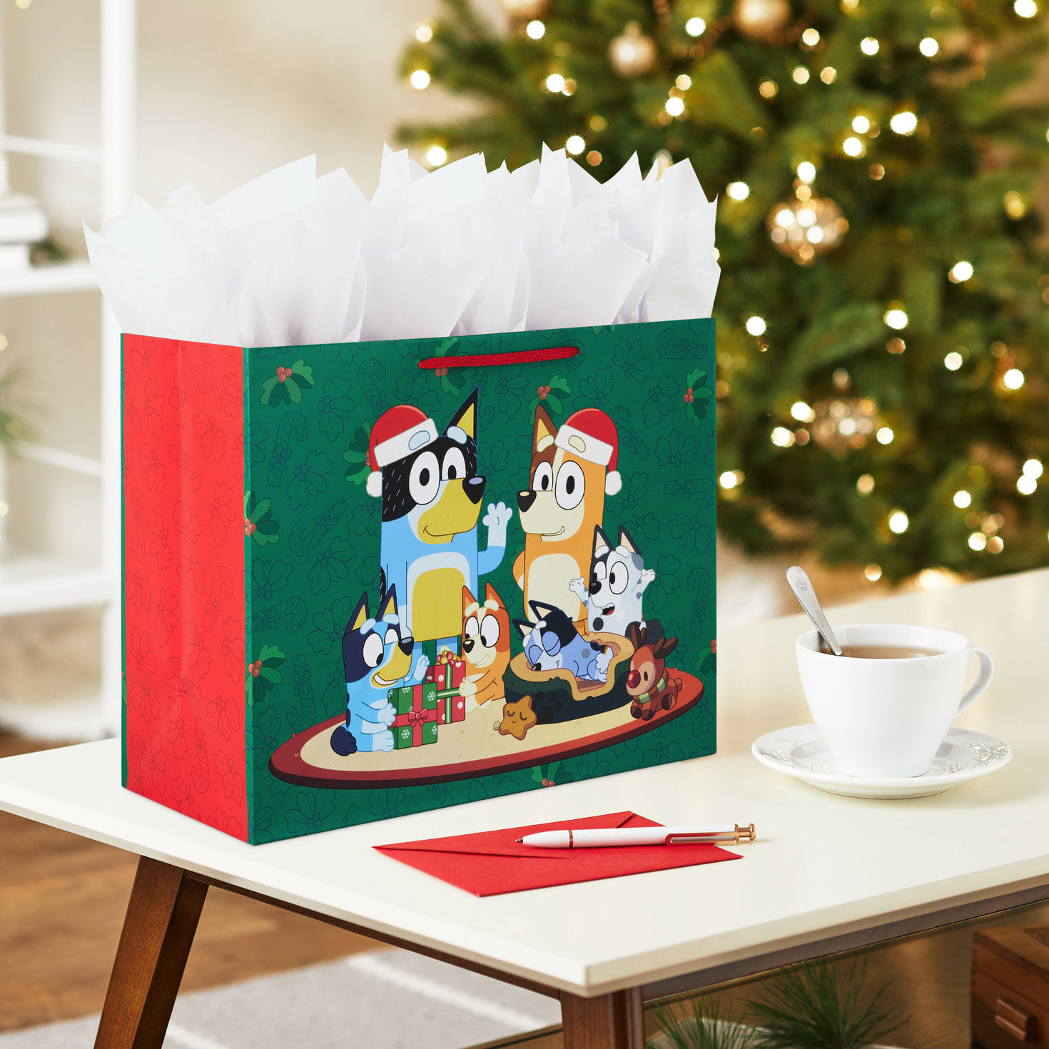 Bluey Family on Green Large Christmas Gift Bag In Use image number 2